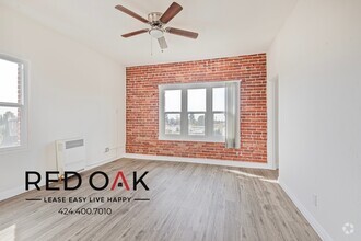 Building Photo - Studio with Exposed Brick Accent Wall, Lot...