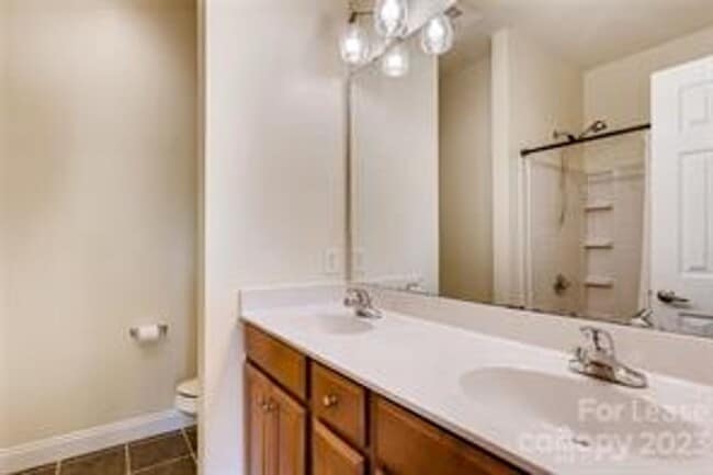 Building Photo - Wonderful craftsman style end-unit townhome