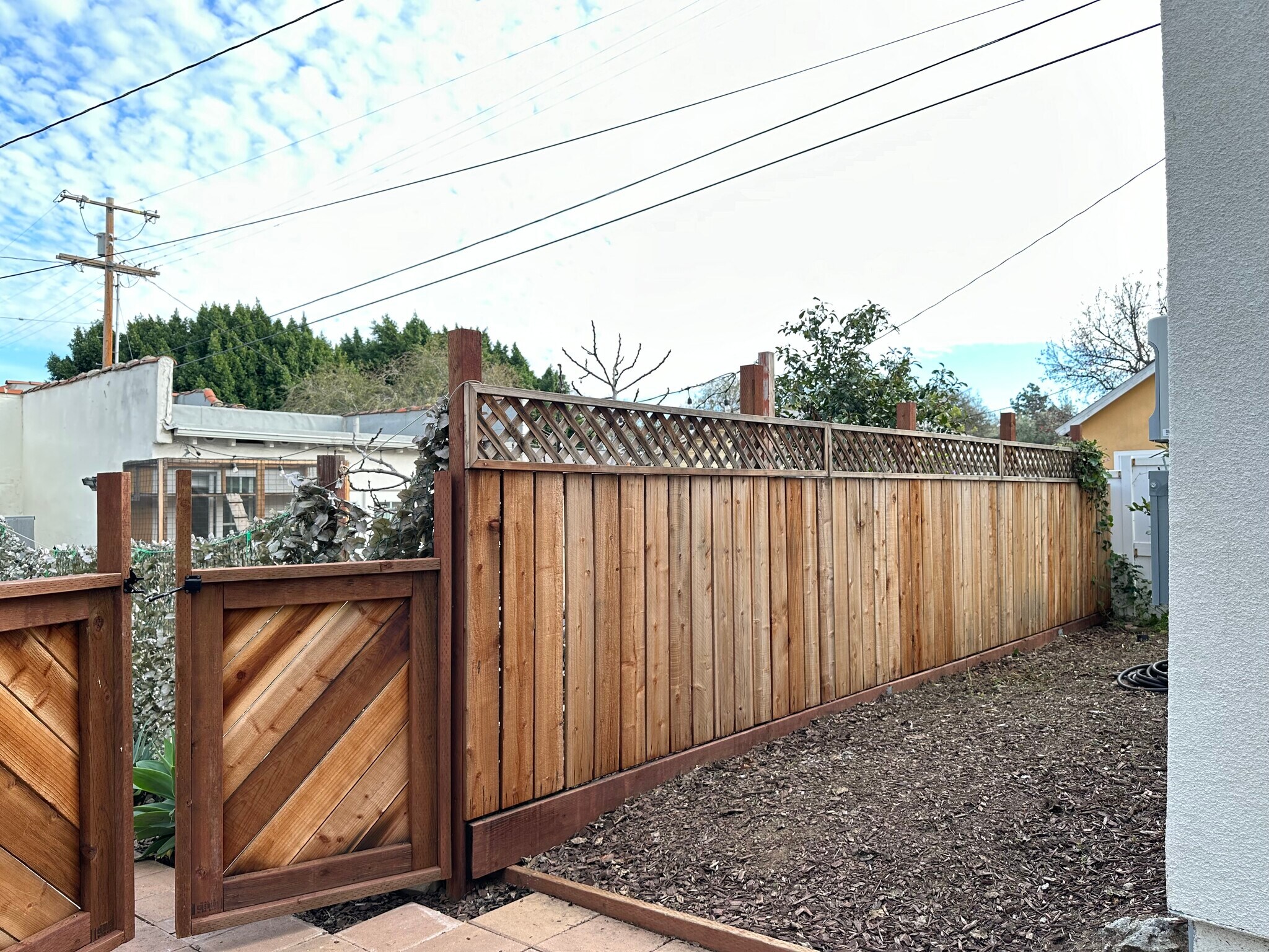 Fence between houses - 3015 Warwick Ave