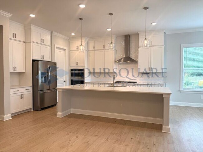 Building Photo - Elegant 4-Bed / 3.5-Bath Home with Main-Level Primary Suite, Quartz Kitchen & 3-Car Garage – In H...