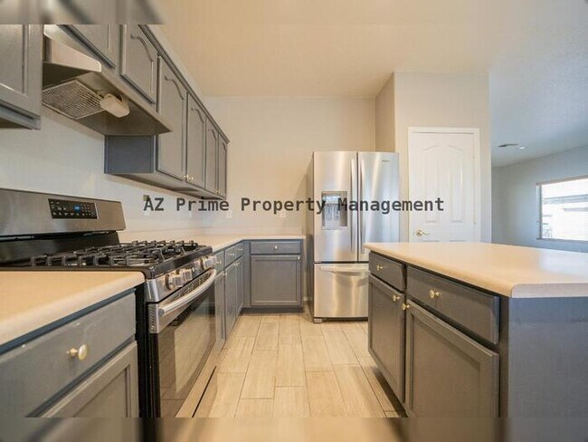 Building Photo - 9461 W Quail Ave