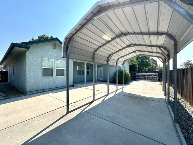 Building Photo - House Available Now!