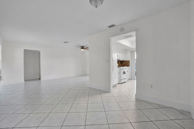 Building Photo - Sunrise Gem: Updated 2-Bed, 2-Bath with Garage Parking