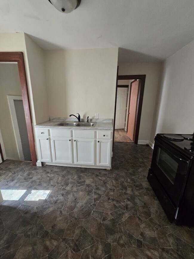 Building Photo - Spacious One Bedroom Duplex Near E. Michigan and Emerson