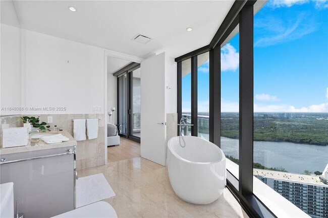 Building Photo - 15701 Collins Ave