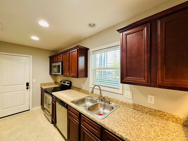 Building Photo - KINGS GRANT - Three bedroom/two bathroom home located within minutes to I40, MLK Parkway and Down...