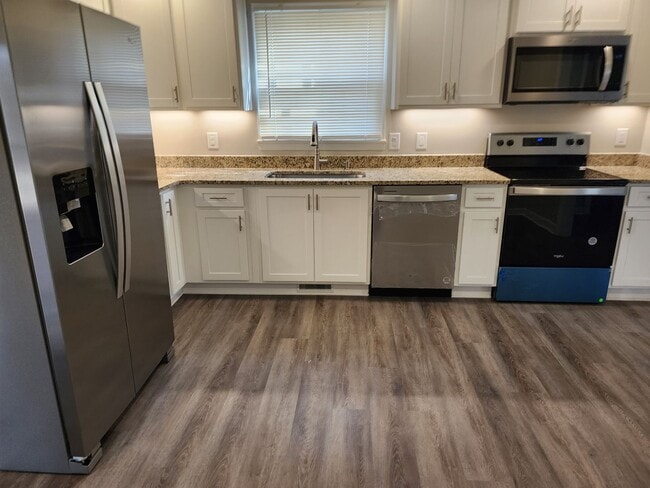 Building Photo - Remodeled Brick Rancher With a Screened Po...