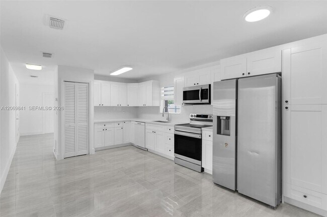 Building Photo - 9999 NW 25th Terrace