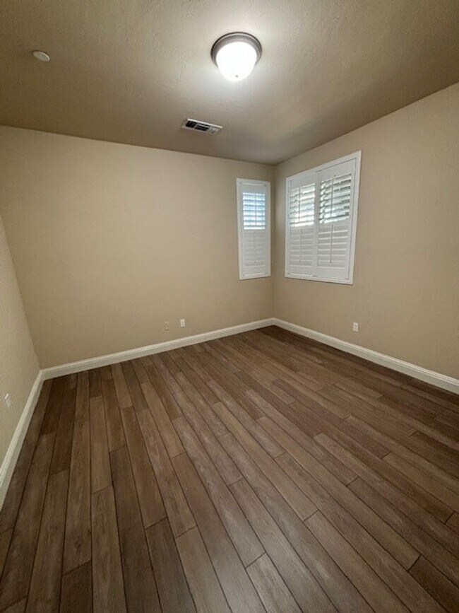 Building Photo - Elegant 4-Bedroom Home with Paid Solar in Gated Village Green Community