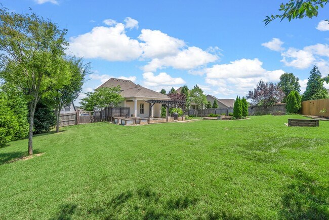 Building Photo - Elegant 4-Bedroom Home with Vaulted Ceilin...