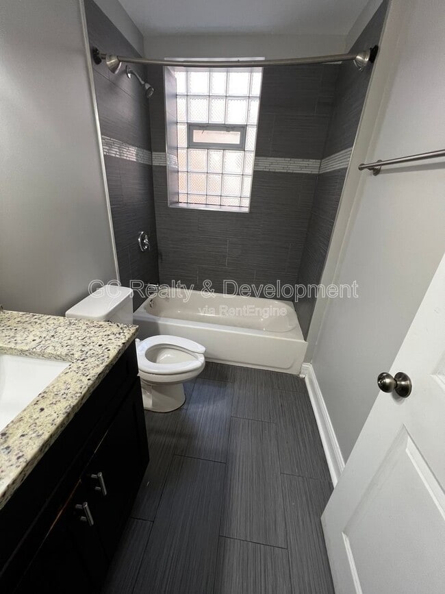 Building Photo - 6031 S Eberhart Ave