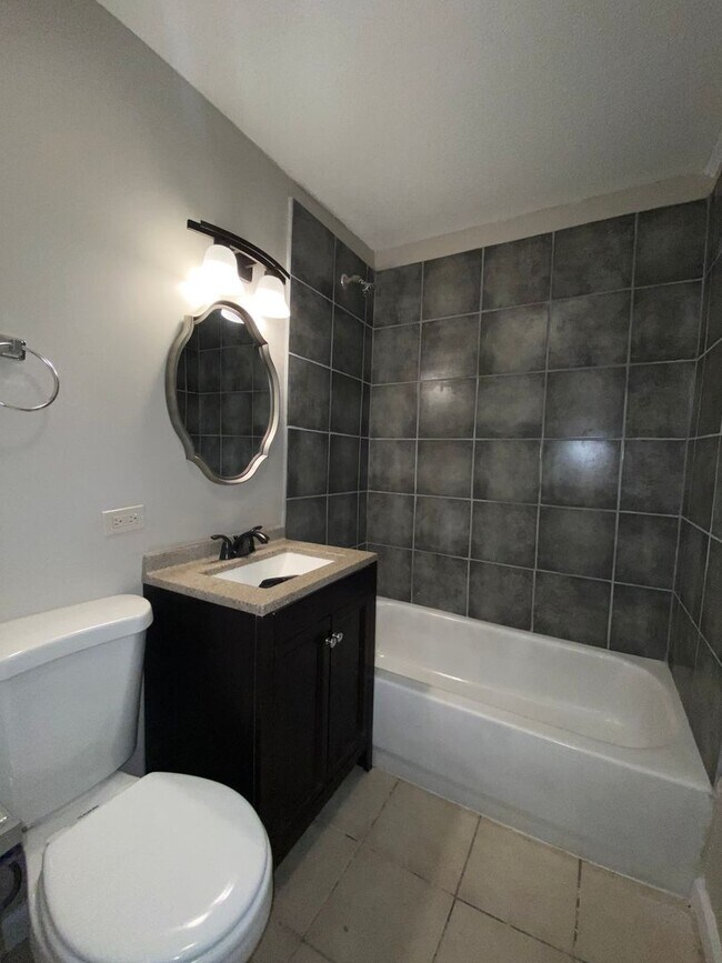 Building Photo - 104/105 7th Ave SE