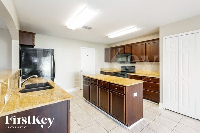 Building Photo - 10714 Opus Dr