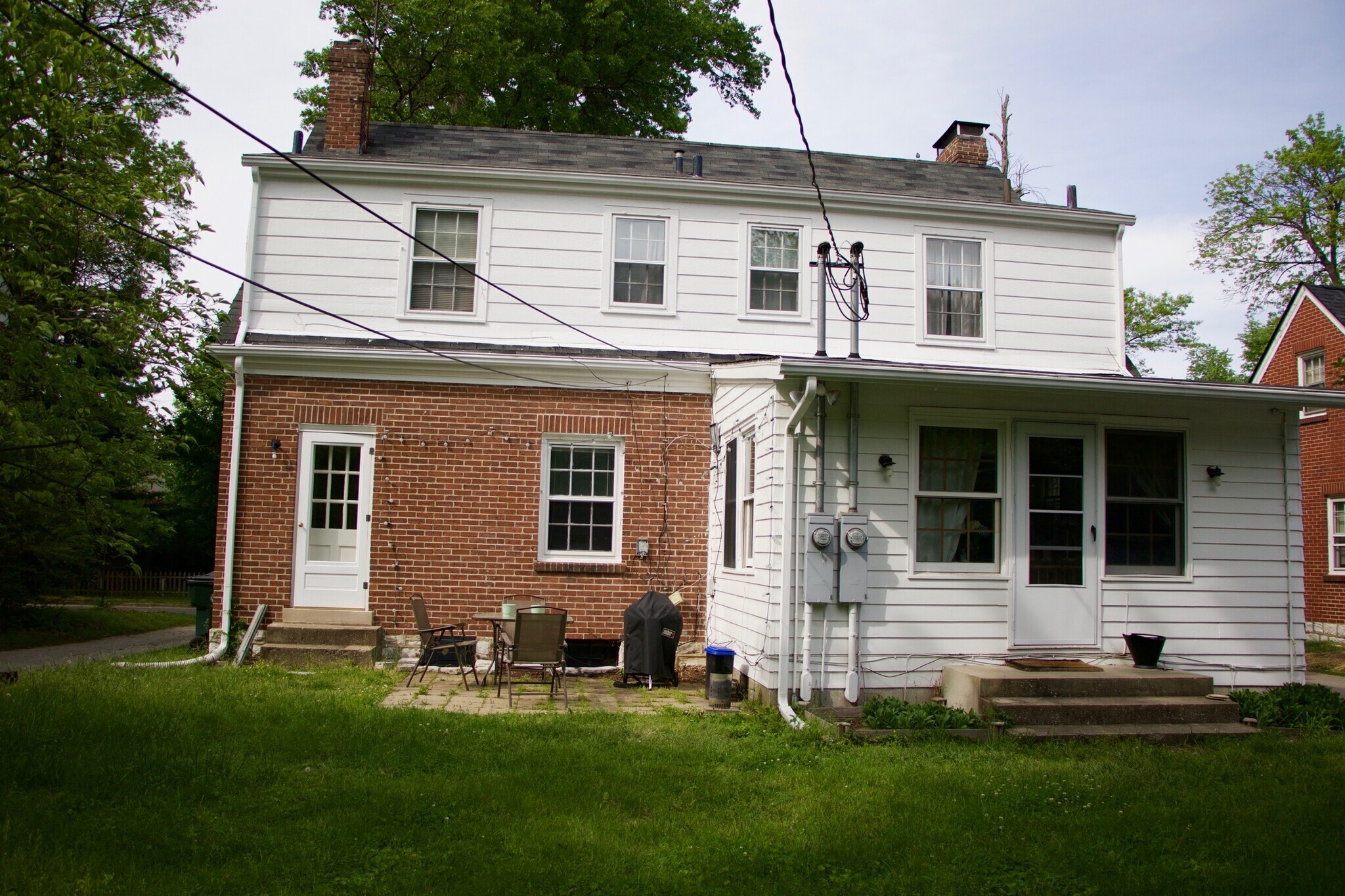 Rear view of home and patio area - 128 Barberry Lane