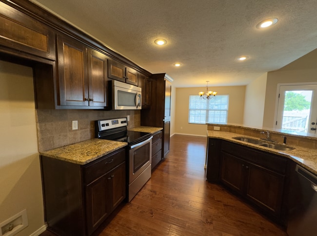 Building Photo - NEW 4 Bedroom | 2 Bathroom | 3 Car Garage ...