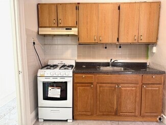 Building Photo - 81-10 37th Ave