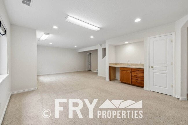 Building Photo - 12975 W 77th Dr