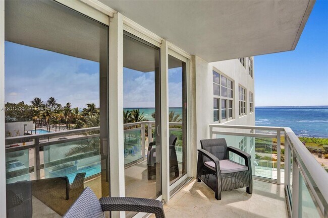 Building Photo - 6917 Collins Ave