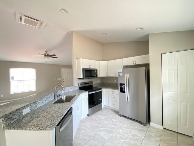 Building Photo - Limited Time Rent Reduction and NO applica...