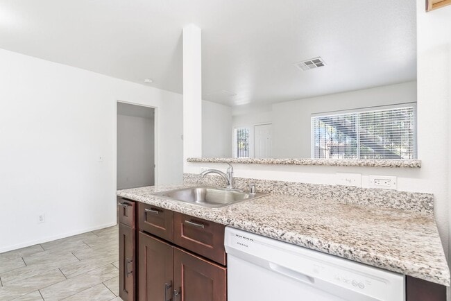Building Photo - Modern Gated Condo Near the Strip with Pool & Covered Parking!