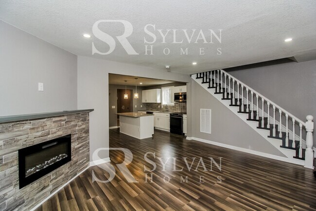 Building Photo - Turn the key. Enter. Smile. Repeat every day!