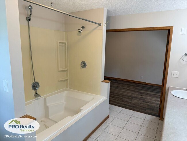 Building Photo - 4 Bedroom Home One Block from Medicine Lake