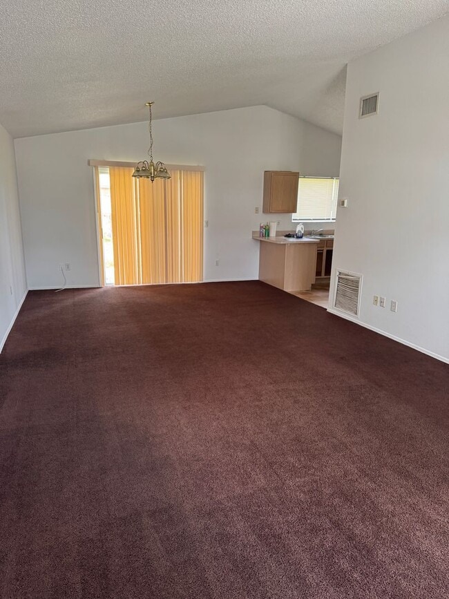 Building Photo - Beautiful Home with Cathedral Ceilings