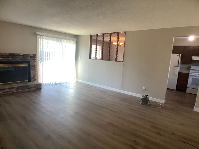 Building Photo - Three bedroom home with large yard| Available July!