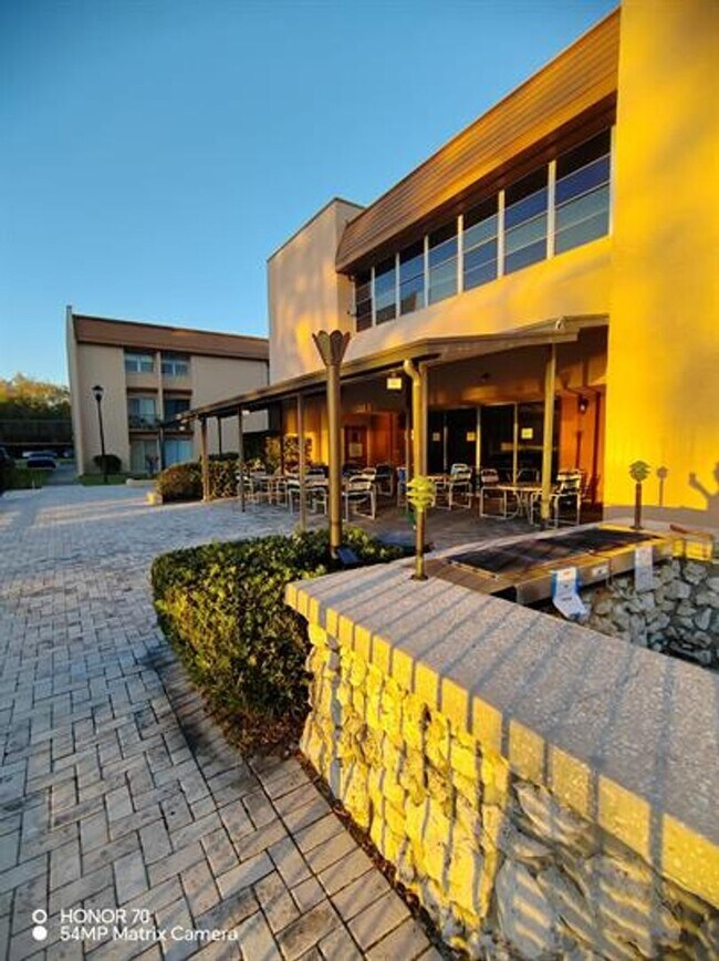 Building Photo - Welcome to Tampa Racquet Club – Where Comfort Meets Convenience!