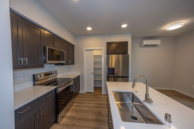 Building Photo - Brand New! - 2 Bedr in Gated Community - Free xfinity Internet