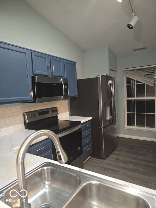 Building Photo - 8209 Twin River Dr