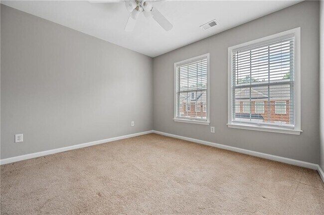 Building Photo - 4721 Creekside Villas Way