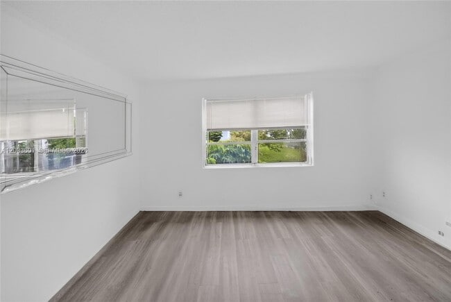 Building Photo - 8750 N Sherman Cir