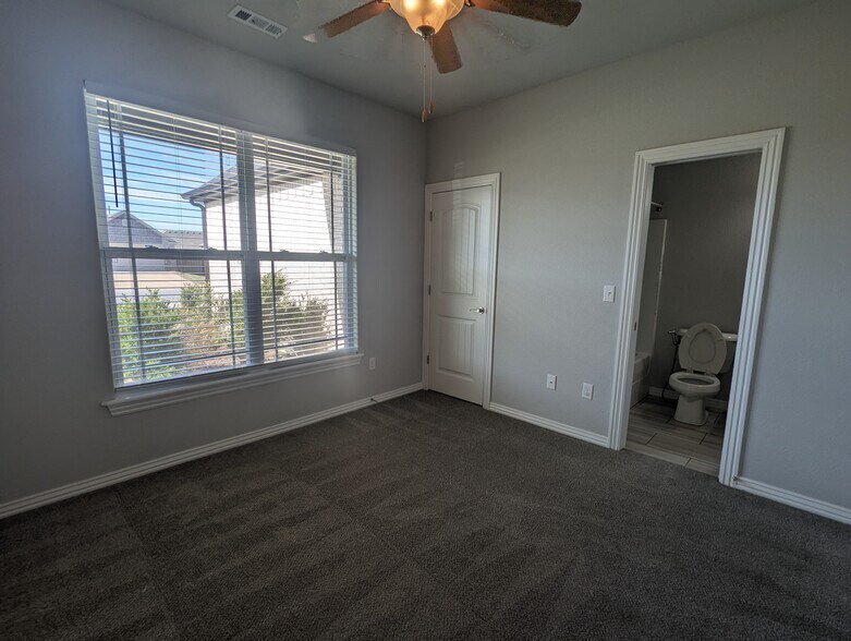 Bedroom, with attached bath - 4360 W Wales Dr