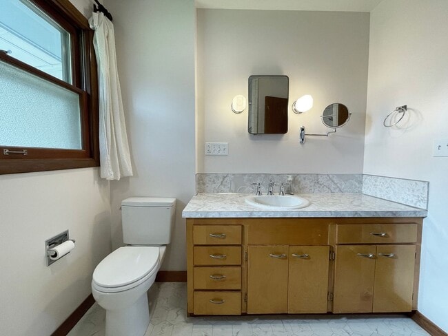 Building Photo - Charming Mid-Century Ranch with Large Yard and Attached Garage