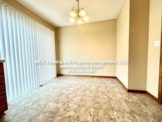 Building Photo - Updated Interior Townhome at Remington Village — Raymore, MO