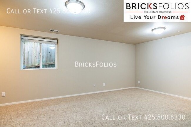 Building Photo - 4-bedroom Lynnwood gem near shops and rest...