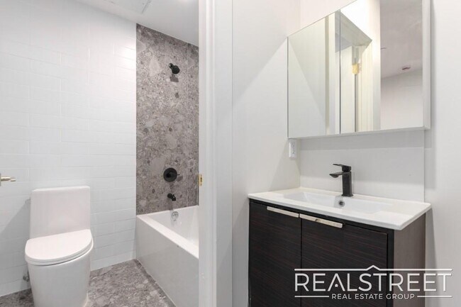 Building Photo - Modern Two-Bedroom Duplex in Prime Clinton Hill – One Block from Pratt University