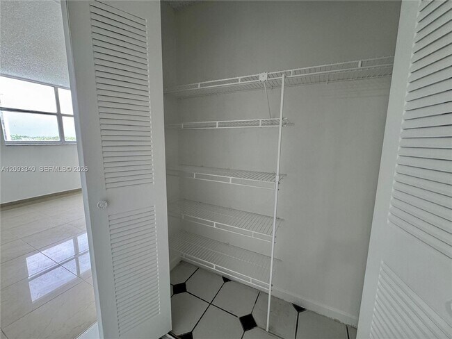 Building Photo - 4675 W 18th Ct