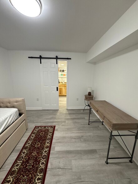 Sliding barn door with entrance to kitchen - 1042 Laurel Grove Rd