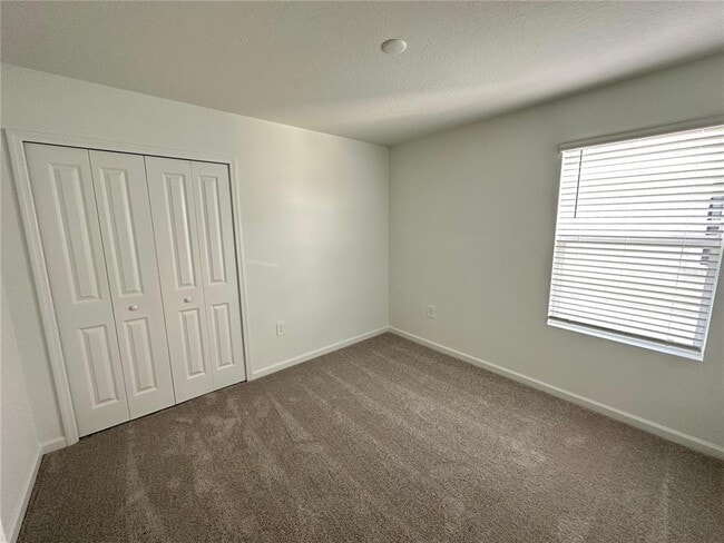 Building Photo - 5675 Portico Pl