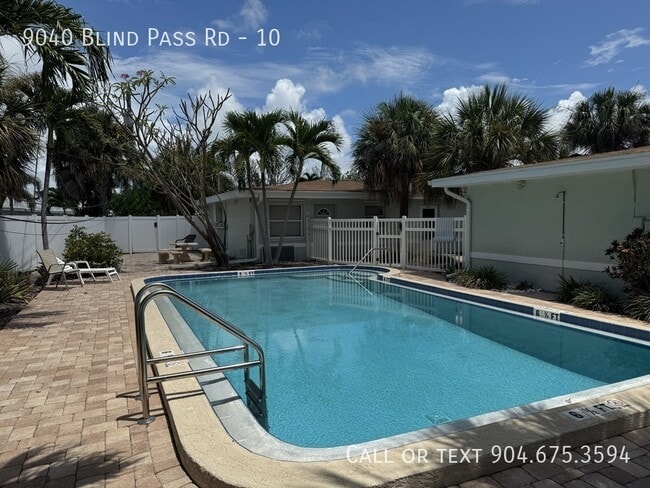 Building Photo - 9040 Blind Pass Rd