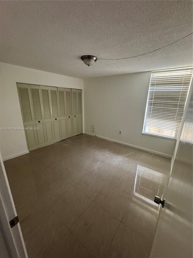 Building Photo - 6841 SW 147th Ave