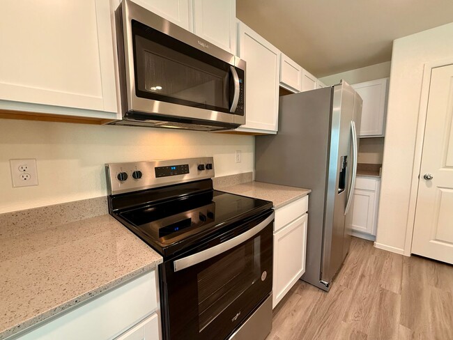 Building Photo - Brand-New Townhome for Rent in the Highly ...