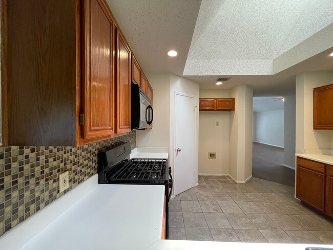 Building Photo - SPACIOUS HOME - NEW FLOORING! - 2 LIVING A...