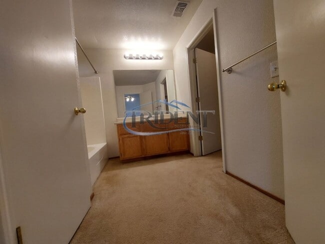 Building Photo - Small pet friendly duplex with front yard landscaping included