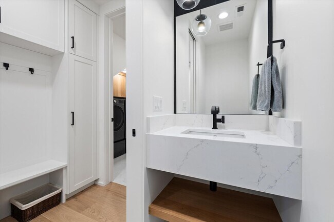 Building Photo - Waterfront End-Unit | 3 Bed | 3 Bath | 2,189 Sq. Ft. | Gated Community | Luxury Lake Living