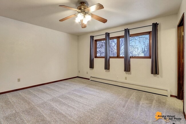 Building Photo - Spacious Home with Garage & Fenced Yard Near JBER & Major Hospitals