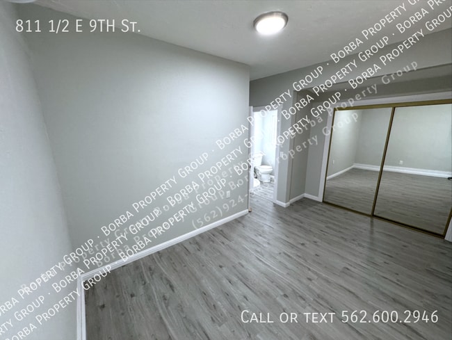 Building Photo - 811 1/2 E 9TH St.-