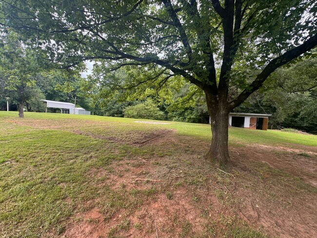 Building Photo - Spacious Brick Ranch on 3 Private Acres in Commerce